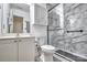Bathroom showcasing vanity and glass-enclosed shower with marble-like tile at 1504 Harpers Inlet Dr, Lake Wylie, SC 29710