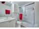 Bright bathroom with vanity, cabinets and shower with sliding glass door at 1504 Harpers Inlet Dr, Lake Wylie, SC 29710
