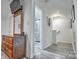 Upstairs hallway with bathroom access and stairs to the lower level at 1504 Harpers Inlet Dr, Lake Wylie, SC 29710