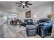 Comfortable living room features stylish furniture, ceiling fan, and decorative lighting at 1504 Harpers Inlet Dr, Lake Wylie, SC 29710