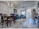 Open living and dining area offers comfortable seating and a ceiling fan at 1504 Harpers Inlet Dr, Lake Wylie, SC 29710