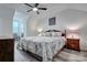 Spacious main bedroom with ample natural light and wood-look flooring at 1504 Harpers Inlet Dr, Lake Wylie, SC 29710