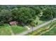 An aerial view of the property showing a home, a large lot, and a country road at 151 Third Creek Rd, Statesville, NC 28677