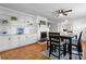 Bright dining area features built-in shelving, a modern table set, and a decorative fireplace at 151 Third Creek Rd, Statesville, NC 28677