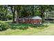 Charming single-story brick home with a fenced yard and mature trees providing a sense of privacy at 151 Third Creek Rd, Statesville, NC 28677