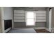 This bedroom features a window and built-in shelves at 1521 N Piedmont Ave, Kings Mountain, NC 28086