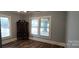 Bedroom with natural light and a large wooden dresser at 1521 N Piedmont Ave, Kings Mountain, NC 28086