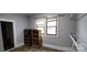 This bedroom features two windows, a bookshelf, and closet at 1521 N Piedmont Ave, Kings Mountain, NC 28086