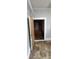 This bedroom features a doorway that leads to a closet with wooden storage at 1521 N Piedmont Ave, Kings Mountain, NC 28086