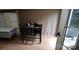This sunroom includes dining table and chairs for flexible living at 1521 N Piedmont Ave, Kings Mountain, NC 28086