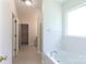 Clean bathroom offers a soaking tub, shower, and a window for natural light at 1540 Coatsworth Ln, Rock Hill, SC 29732