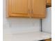Close-up of white countertops, backsplash, and cabinets at 1540 Coatsworth Ln, Rock Hill, SC 29732