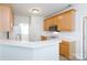 Kitchen boasts wood cabinets, white countertops, and a stainless steel microwave and oven at 1540 Coatsworth Ln, Rock Hill, SC 29732