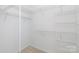 Large walk-in closet with adjustable wire shelving to maximize storage solutions at 1540 Coatsworth Ln, Rock Hill, SC 29732