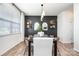 Contemporary dining room featuring a dark wood table, stylish chairs, and elegant decor at 1624 Savory Ln, Charlotte, NC 28216