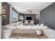 Comfortable living room with neutral-toned furniture, a large window, and a ceiling fan at 1624 Savory Ln, Charlotte, NC 28216