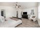 Cozy main bedroom featuring warm tones, a sitting area, and ample space for relaxation and comfort at 1624 Savory Ln, Charlotte, NC 28216