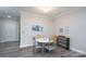 Cozy dining area with a round table, stylish chairs, and a decorative buffet at 18511 Harborside Dr, Cornelius, NC 28031
