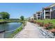 Scenic waterfront walkway lined with lush greenery and access to residences at 18511 Harborside Dr, Cornelius, NC 28031