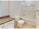Bathroom with tub, granite countertops and white cabinets at 2143 Barrowcliffe Nw Dr, Concord, NC 28027