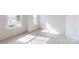 Bright bedroom featuring two windows at 2143 Barrowcliffe Nw Dr, Concord, NC 28027