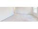 Spacious bedroom with neutral carpet and bright natural light at 2143 Barrowcliffe Nw Dr, Concord, NC 28027