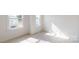Well-lit bedroom with large windows at 2143 Barrowcliffe Nw Dr, Concord, NC 28027