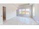 Spacious bedroom with neutral carpet, bright natural light, and closet with shelving at 2143 Barrowcliffe Nw Dr, Concord, NC 28027
