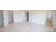 Spacious bedroom with multiple doorways showing access to other rooms at 2143 Barrowcliffe Nw Dr, Concord, NC 28027