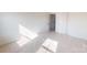Empty bedroom with a neutral color scheme and light-filled space at 2143 Barrowcliffe Nw Dr, Concord, NC 28027