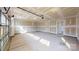 Spacious two-car garage, with single garage door and features access door to the home at 2143 Barrowcliffe Nw Dr, Concord, NC 28027
