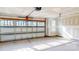 Spacious two-car garage, features a single garage door with windows for natural light at 2143 Barrowcliffe Nw Dr, Concord, NC 28027