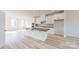 Modern kitchen featuring white cabinets, stainless steel appliances, and a granite-topped island at 2143 Barrowcliffe Nw Dr, Concord, NC 28027