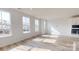 Bright, spacious living room with hardwood floors and lots of natural light from large windows at 2143 Barrowcliffe Nw Dr, Concord, NC 28027