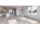 Bright open concept living area featuring hardwood flooring, neutral colors, and recessed lighting at 2143 Barrowcliffe Nw Dr, Concord, NC 28027