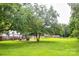 Spacious backyard featuring a covered patio area perfect for outdoor entertaining and relaxation at 218 Blacksnake Rd, Stanley, NC 28164