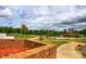 Community ball field is set against a lush green backdrop, inviting residents for outdoor activities at 218 Blacksnake Rd, Stanley, NC 28164
