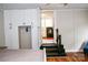 Bedroom features a built-in wardrobe and steps leading up to an adjacent kitchen at 218 Blacksnake Rd, Stanley, NC 28164