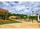 Community playground featuring a 'Fun Zone' area with diverse play equipment and lush landscaping at 218 Blacksnake Rd, Stanley, NC 28164