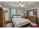 Charming bedroom with a bed, wood floors, and dresser, creating a relaxing and inviting atmosphere at 2526 Ashford Dr, Newton, NC 28658