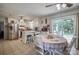 Bright kitchen and breakfast nook with stainless steel appliances, tile floors, and plenty of counter space at 2526 Ashford Dr, Newton, NC 28658