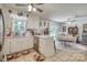 Open kitchen view with ample counter space, tile floors, and an adjacent breakfast nook perfect for Gathering meals at 2526 Ashford Dr, Newton, NC 28658