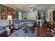 A spacious living room with hardwood floors, a large grey sectional, and ample space for relaxation and entertainment at 2526 Ashford Dr, Newton, NC 28658