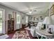 Comfortable living room with hardwood floors, ceiling fan, and ample natural light at 2526 Ashford Dr, Newton, NC 28658