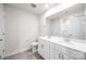 Well-lit bathroom with double vanity, large mirror, and modern fixtures at 4046 Armstrong Farm Dr, Belmont, NC 28012