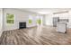 Hardwood floors, fireplace, and open floorplan in a well lit living room at 4046 Armstrong Farm Dr, Belmont, NC 28012