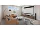Home theater including a sectional sofa, large screen and speaker system, perfect for entertainment at 4046 Armstrong Farm Dr, Belmont, NC 28012