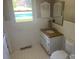 Bathroom featuring a white vanity with granite countertop, tiled walls, and a mirrored medicine cabinet at 4050 Rollingwood Cir, Rock Hill, SC 29732