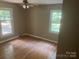 Bedroom features two large windows and hardwood floors at 4050 Rollingwood Cir, Rock Hill, SC 29732