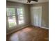 Cozy bedroom features natural light, hardwood floors and closet space at 4050 Rollingwood Cir, Rock Hill, SC 29732